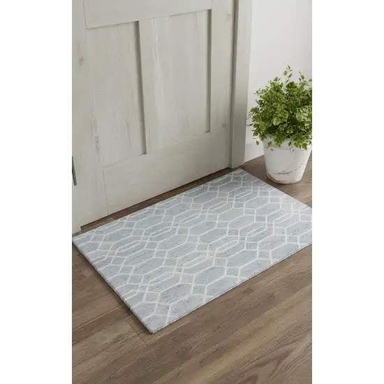 Blue And Ivory Wool Geometric Tufted Handmade Stain Resistant Area Rug Photo 1