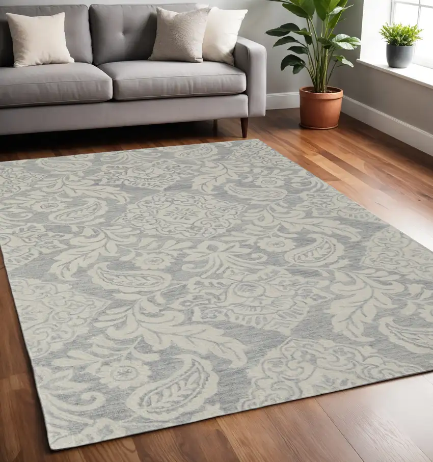 Blue And Ivory Wool Paisley Tufted Handmade Stain Resistant Area Rug Photo 1