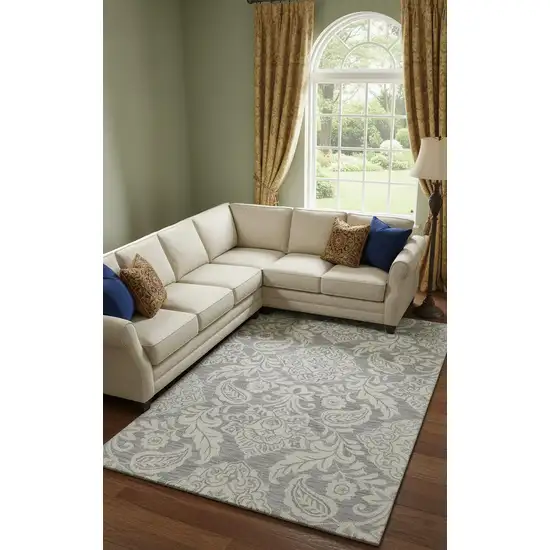 Blue And Ivory Wool Paisley Tufted Handmade Stain Resistant Area Rug Photo 1