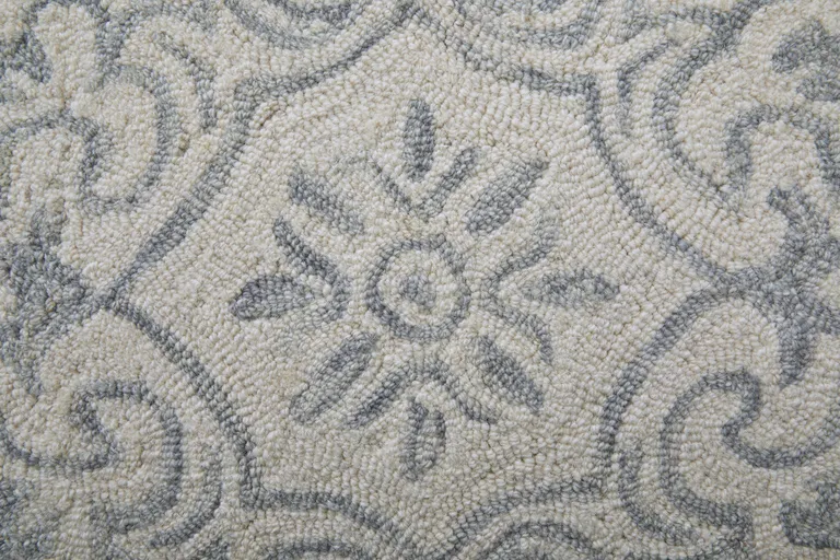 Blue And Ivory Wool Paisley Tufted Handmade Stain Resistant Area Rug Photo 1