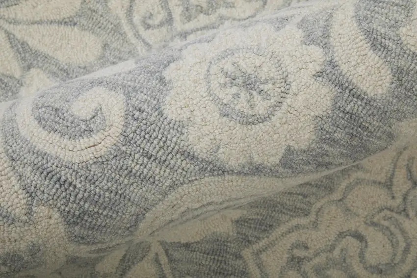 Blue And Ivory Wool Paisley Tufted Handmade Stain Resistant Area Rug Photo 9