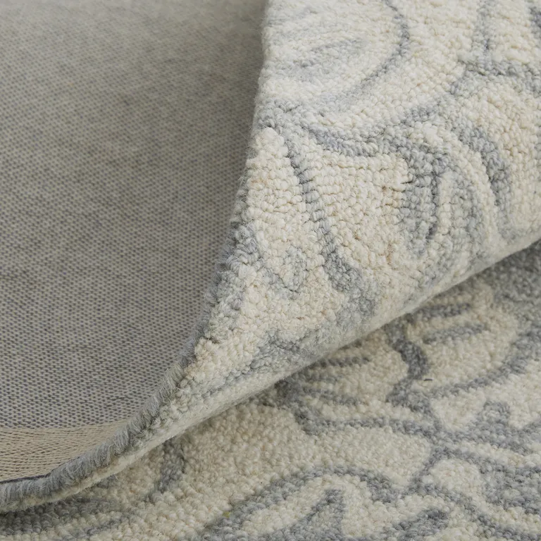Blue And Ivory Wool Paisley Tufted Handmade Stain Resistant Area Rug Photo 4