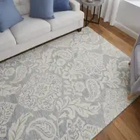 Photo of Blue And Ivory Wool Paisley Tufted Handmade Stain Resistant Area Rug
