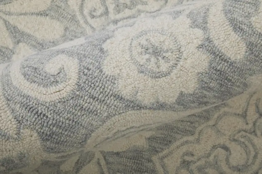 Blue And Ivory Wool Paisley Tufted Handmade Stain Resistant Area Rug Photo 6