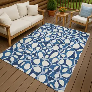 Photo of Blue And Navy Blue Abstract Washable Indoor Outdoor Area Rug