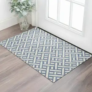 Photo of Blue And Off White Trellis Washable Area Rug With UV Protection