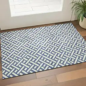 Photo of Blue And Off White Trellis Washable Area Rug With UV Protection