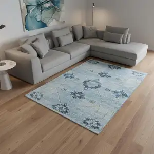 Photo of Blue And Olive Green Floral Medallion Washable Area Rug With UV Protection
