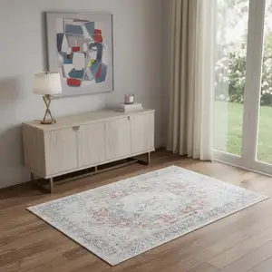 Photo of Blue And Orange Medallion Area Rug With UV Protection