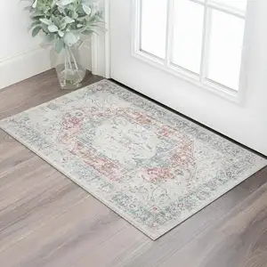 Photo of Blue And Orange Medallion Distressed Area Rug
