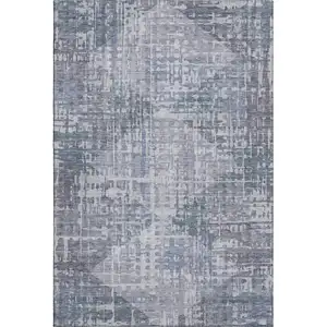 Photo of Blue And Purple Geometric Washable Area Rug With UV Protection
