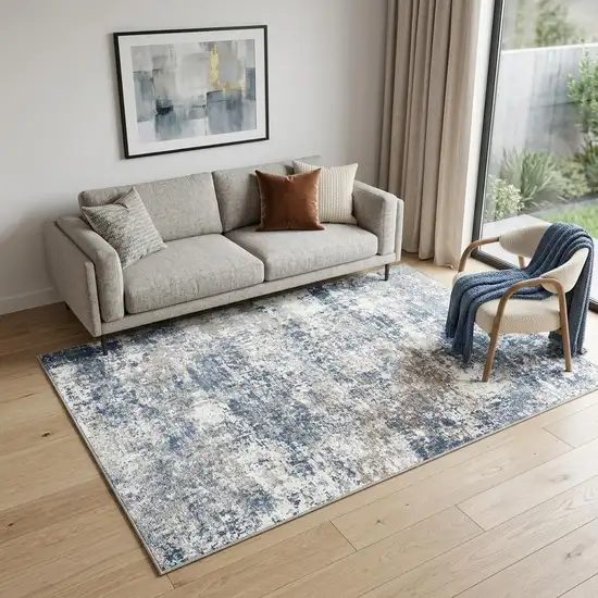 Blue And Ivory Abstract Washable Area Rug Photo 1