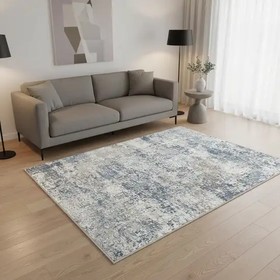 Blue And Ivory Abstract Washable Area Rug Photo 1