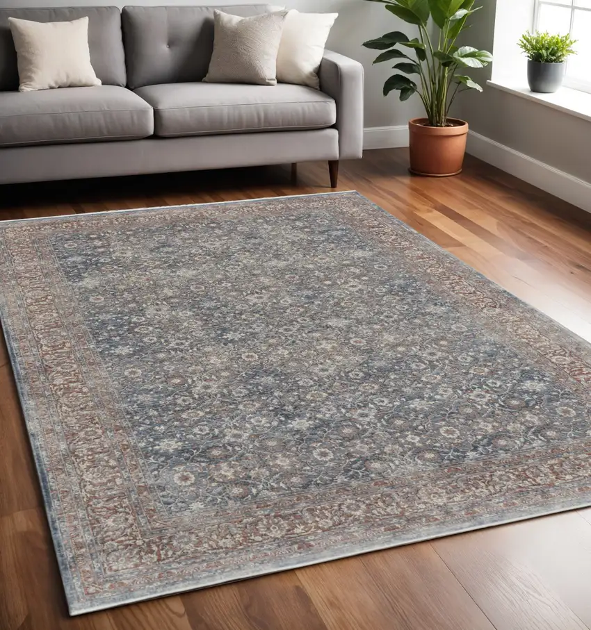 Blue and Beige Floral Power Loom Area Rug Photo 1