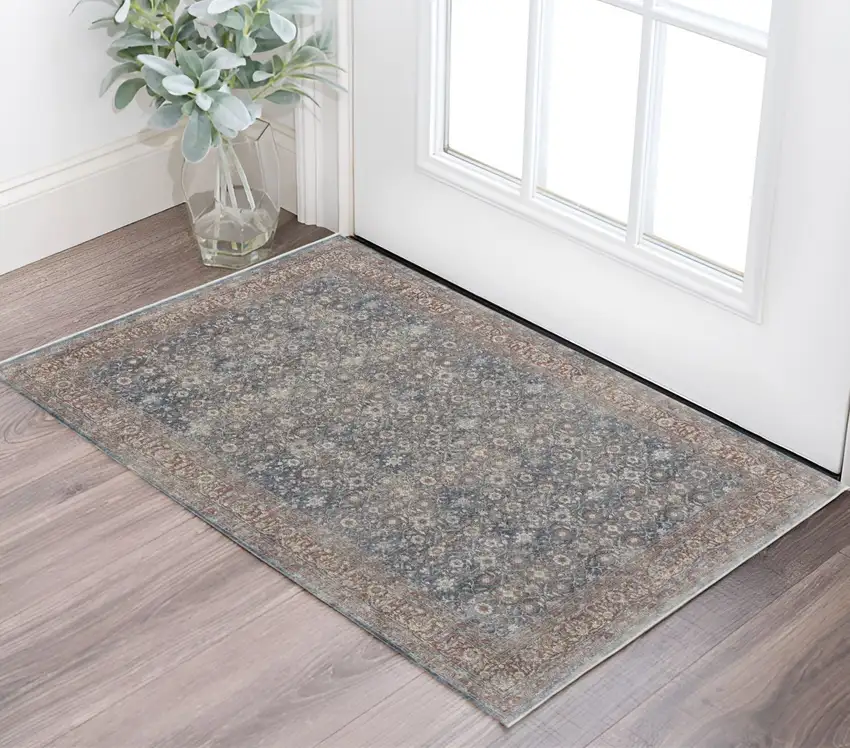 Blue and Beige Floral Power Loom Area Rug Photo 1