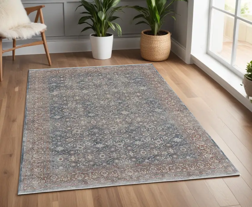 Blue and Beige Floral Power Loom Area Rug Photo 1