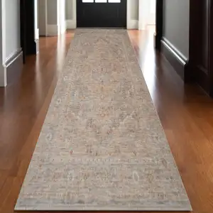 Photo of Blue And Sand Floral Medallion Runner Rug With Fringe