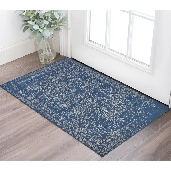 Blue and Silver Wool Floral Hand Tufted Distressed Area Rug Photo 1
