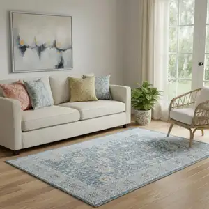 Photo of Blue And Sky Blue Floral Distressed Area Rug