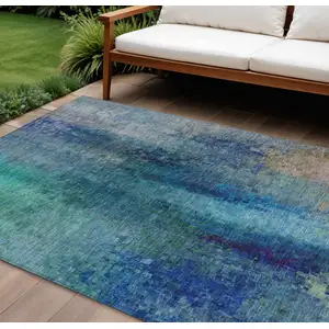 Photo of Blue And Tan Abstract Washable Indoor Outdoor Area Rug