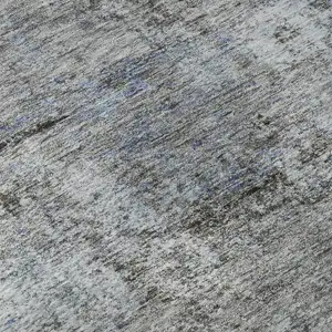 Photo of Blue And Taupe Abstract Washable Area Rug With UV Protection