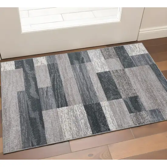 Blue And Gray Patchwork Distressed Area Rug Photo 1