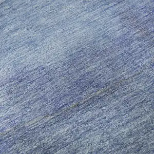 Photo of Blue And Teal Striped Washable Area Rug With UV Protection