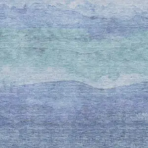 Photo of Blue And Teal Striped Washable Area Rug With UV Protection