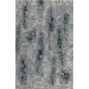 Photo of Blue And White Abstract Distressed Area Rug
