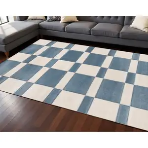 Photo of Blue And White Geometric Area Rug