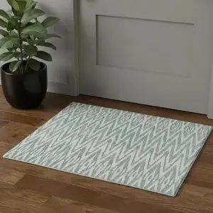 Photo of Blue And White Wool Chevron Hand Tufted Area Rug