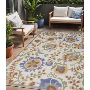 Photo of Blue And Yellow Floral Power Loom Area Rug