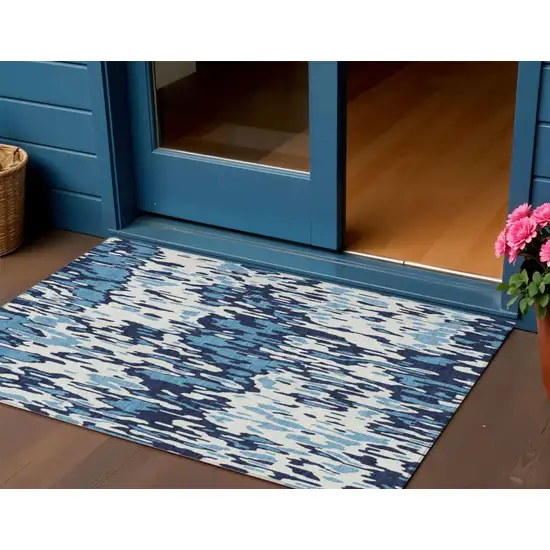 Blue Aqua And Ivory Striped Washable Indoor Outdoor Area Rug Photo 1