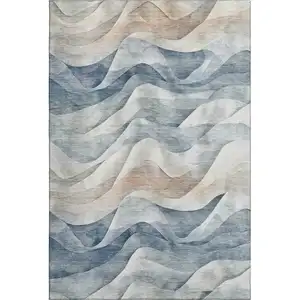 Photo of Blue Beige And Ivory Abstract Washable Area Rug With UV Protection