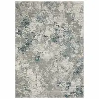 Photo of Blue Beige And Teal Abstract Power Loom Stain Resistant Area Rug