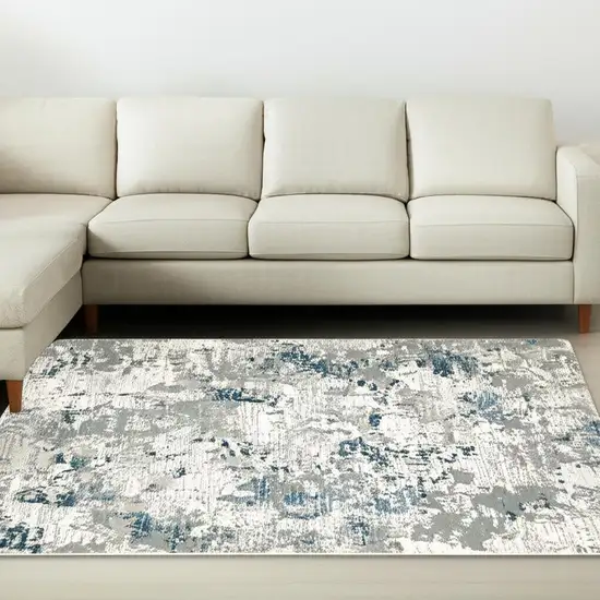 Blue and Beige Abstract Power Loom Area Rug Photo 1