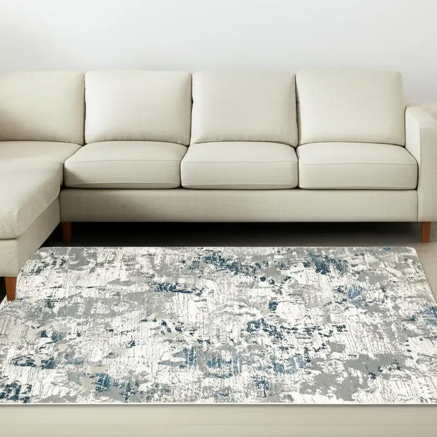 Blue and Beige Abstract Power Loom Area Rug Photo 1