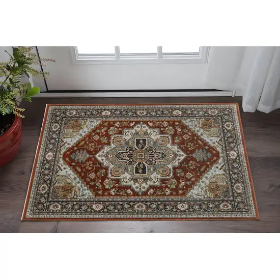 Blue Beige Grey Gold Green And Rust Red Oriental Power Loom Stain Resistant Area Rug With Fringe Photo 1