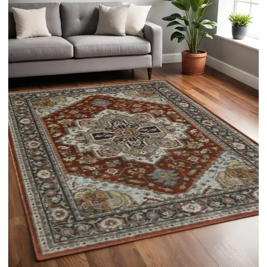 Blue Beige Grey Gold Green And Rust Red Oriental Power Loom Stain Resistant Area Rug With Fringe Photo 1