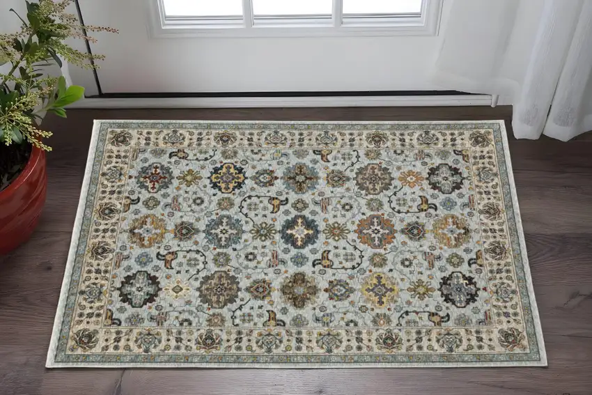 Blue Beige Grey Green Yellow And Rust Oriental Power Loom Stain Resistant Area Rug With Fringe Photo 1