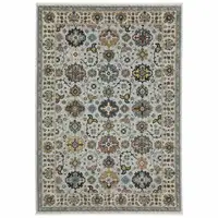 Photo of Blue Beige Grey Green Yellow And Rust Oriental Power Loom Stain Resistant Area Rug With Fringe