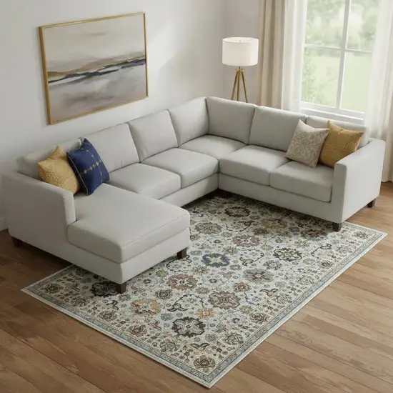 Blue Beige Grey Green Yellow And Rust Oriental Power Loom Stain Resistant Area Rug With Fringe Photo 1