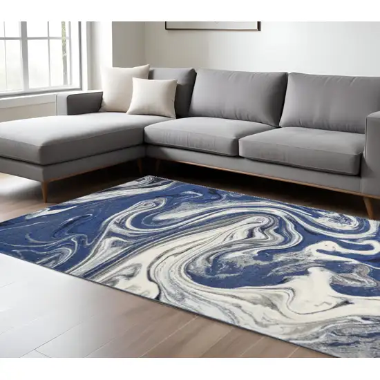 Blue And Beige Abstract Area Rug Photo 1