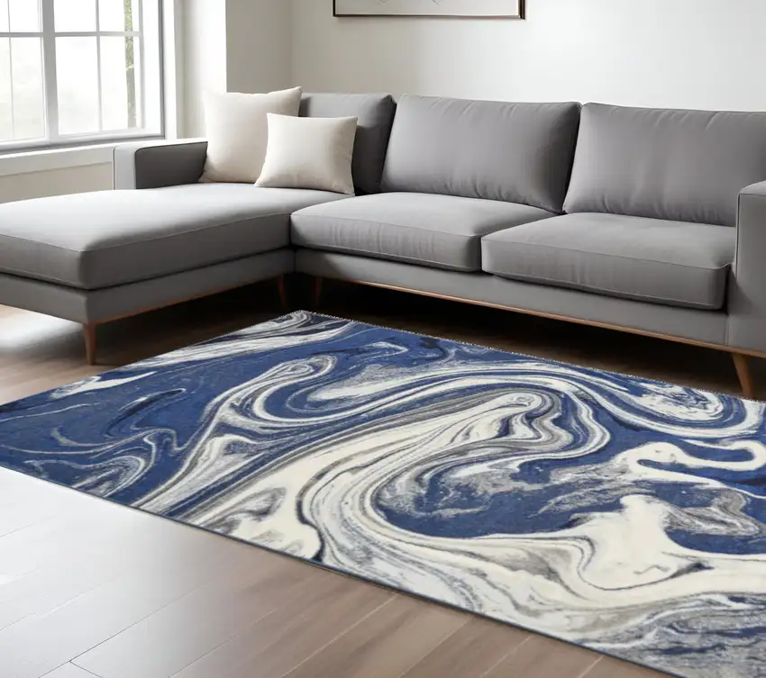 Blue And Beige Abstract Area Rug Photo 1
