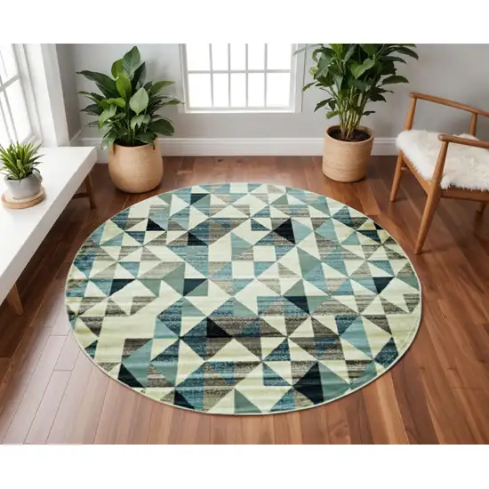 8' Beige Blue And Gray Geometric Round Rug Photo 1