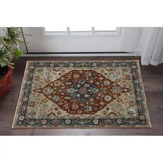 Blue Beige Tan Brown Gold And Rust Red Oriental Power Loom Stain Resistant Area Rug With Fringe Photo 1