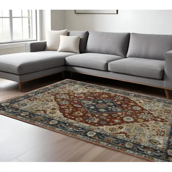 Blue Beige Tan Brown Gold And Rust Red Oriental Power Loom Stain Resistant Area Rug With Fringe Photo 1