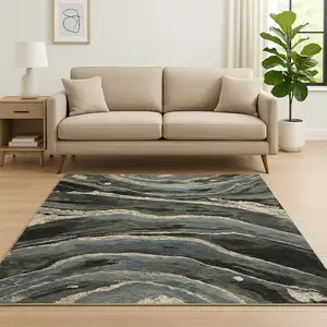 Photo of Blue Black And Beige Abstract Area Rug With Fringe