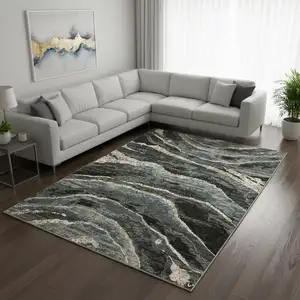 Photo of Blue Black And Beige Abstract Area Rug With Fringe