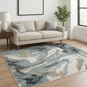 Photo of Blue Black And Ivory Abstract Area Rug With Fringe